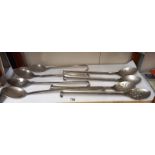 A quantity of 1980's military issue serving spoons etc.