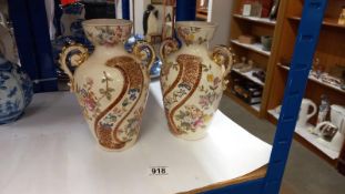 A pair of Victorian pottery vases