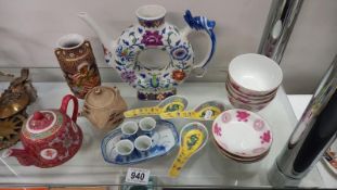 A selection of Chinese pottery bowls & teapots etc.