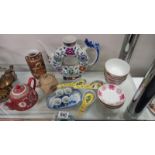 A selection of Chinese pottery bowls & teapots etc.