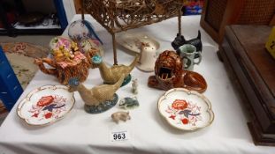 A mixed lot including Beswick Loch Ness monster x 2, coal Scottie dog, Royal crown derby 50 year