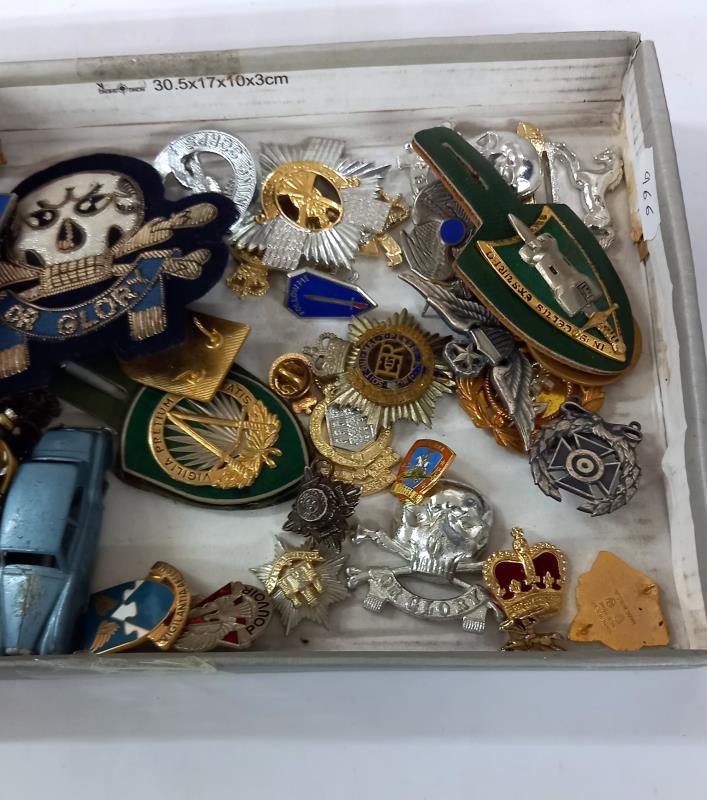 A quantity of military cap badges etc. Including some die cast Dinky - Image 3 of 3