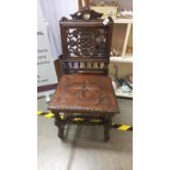 A 19th century oak carved hall chair, COLLECT ONLY