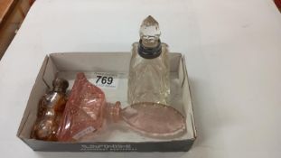 A silver necked perfume bottle & 2 others
