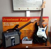 A Squire by Fender guitar & amp