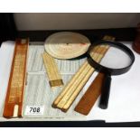 A quantity of vintage slide rules etc. Including magnifying glass