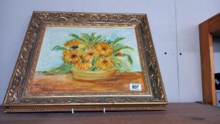 An oil on board still life Marigolds, signed H. Richardson