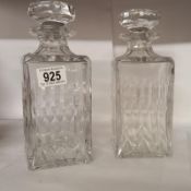 A pair of square cut glass decanters