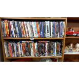 2 shelves of DVD's plus 2 Blu Ray