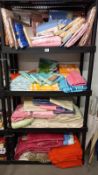 4 shelves of vintage sheets, blankets & towel, many unopened