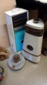 A vintage Aladdin paraffin heater and 1 other and greenhouse heater