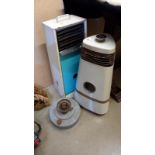 A vintage Aladdin paraffin heater and 1 other and greenhouse heater