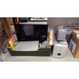 A Seiki TV (no controls & needs to be wall mounted) A Pacific DVD player (no control) & a Sync