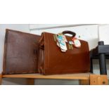 A leather briefcase & a suitcase