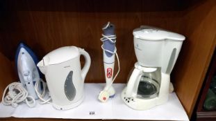 A Breville iron, Kenwood kettle, Russell Hobbs coffee maker 7 Phillips blender