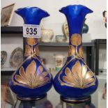 A pair of Victorian blue glass vases with gilded overlay