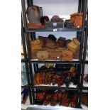 A large quantity of vintage empty camera cases, 4 shelves