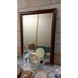 A wooden framed mirror 100cm x 70cm