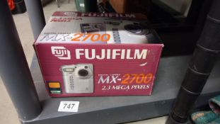 A boxed Fuji digital camera MX-2700