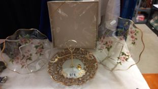 A boxed glass cake stand and 2 other decorative glass plates