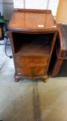 An Edwardian walnut veneered bedside pot cupboard