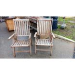 A pair of folding teak garden chairs, COLLECT ONLY