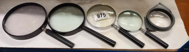 A quantity of magnifying glasses