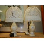 A pair of onyx table lamps.