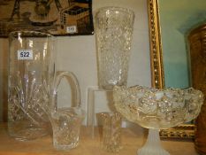 Two cut glass vases, a cut glass basket and a moulded glass vase. COLLECT ONLY.
