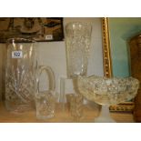 Two cut glass vases, a cut glass basket and a moulded glass vase. COLLECT ONLY.