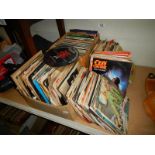 A large quantity of 45 rpm records.