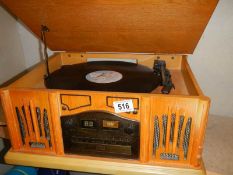A vintage style record player with radio and CD features, COLLECT ONLY.