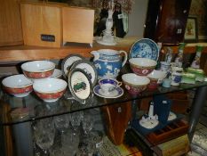 A large lot of ceramics including Chinese finger bowls, Wade veteran car, dishes etc.,