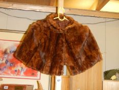 An early 20th century fur shoulder cape.