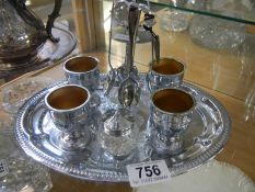 A 1930's chrome plated egg cup stand.