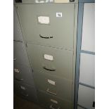 A steel four drawer filing cabinet. COLLECT ONLY