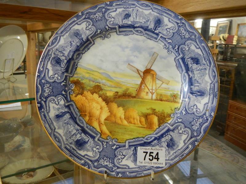 A Copeland Spode 1921 hand painted plate.