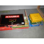 A quantity of board games including 50th anniversary scrabble, completeness unknown.