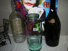 An old sweet jar and two bottles.