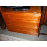 A golden oak effect three drawer chest, COLLECT ONLY.