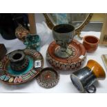 Two vintage terracotta ashtrays and one other.