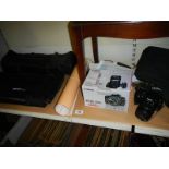 A Canon EOS 350D digital camera, bag, accessories and photo cube.