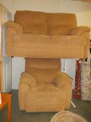 A beige two seat sofa with matching chair. COLLECT ONLY.