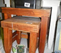 A nest of three teak tables, (the large table painted white). COLLECT ONLY.