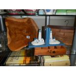 A carved teak letter rack, lighthouse bookends etc.,