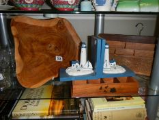 A carved teak letter rack, lighthouse bookends etc.,
