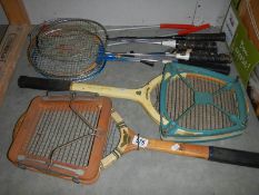 A vintage Dunlop Matchplay Tennis racket, a Grays Whiteman cup tennis racket & a qty of badminton