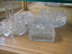 A mixed lot of glass ware including fruit bowl, butter dish, knife rests etc.,