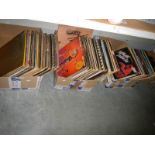 Three boxes of LP records.