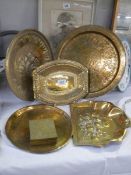 A quantity of vintage brass trays including crumb tray. COLLECT ONLY.